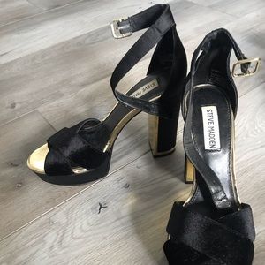 Black and gold pumps